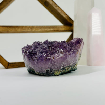 amethyst bowl with decorations in the background