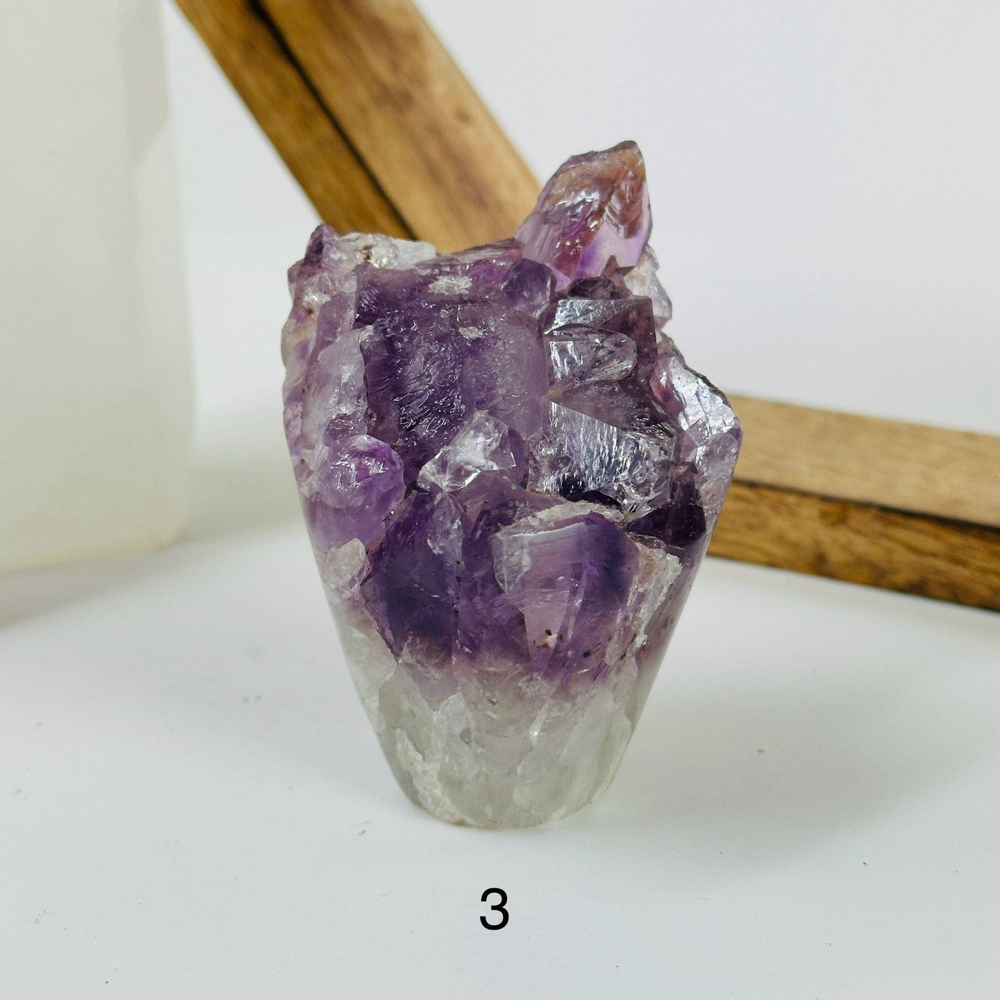 amethyst crystal flowers with decorations in the background