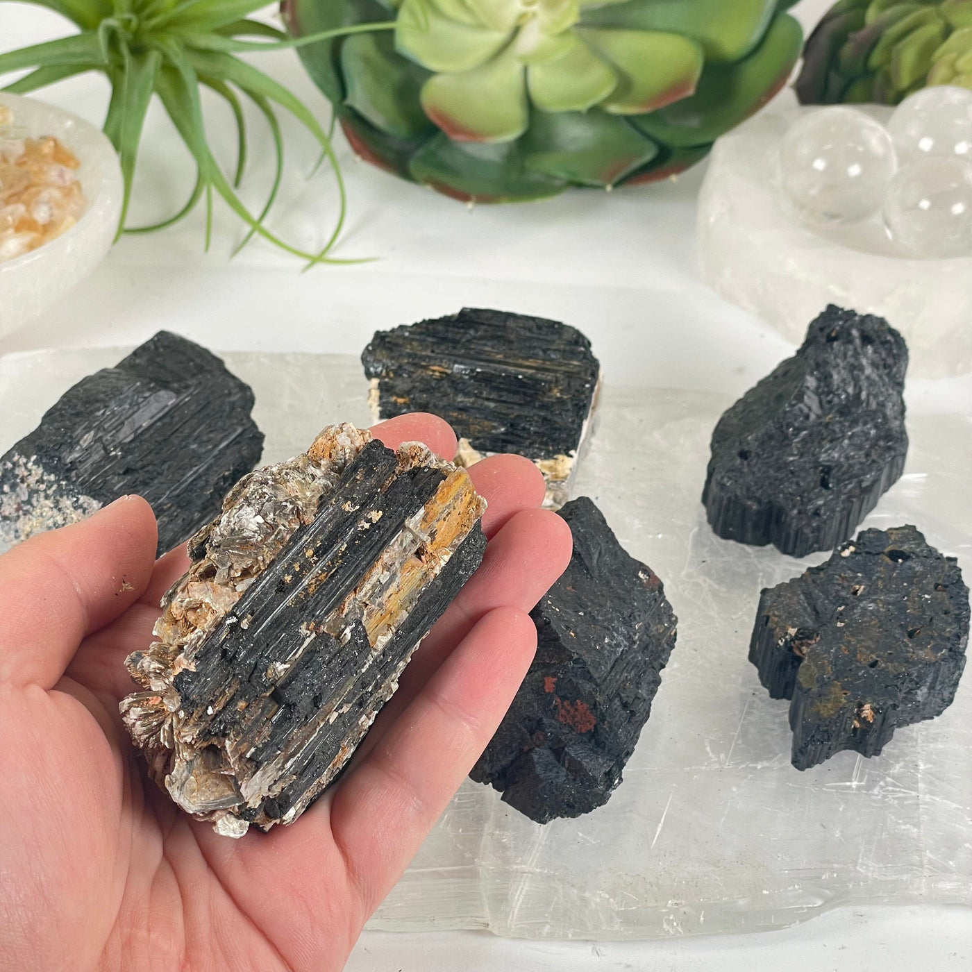 Black Tourmaline Crystal Chunks - You Get All #2 one in hand for size reference with others in background