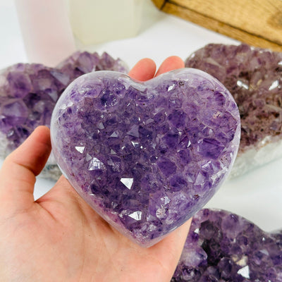 Amethyst hearts with decorations in the background