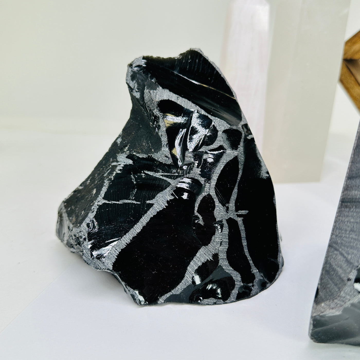 obsidian with decorations in the background