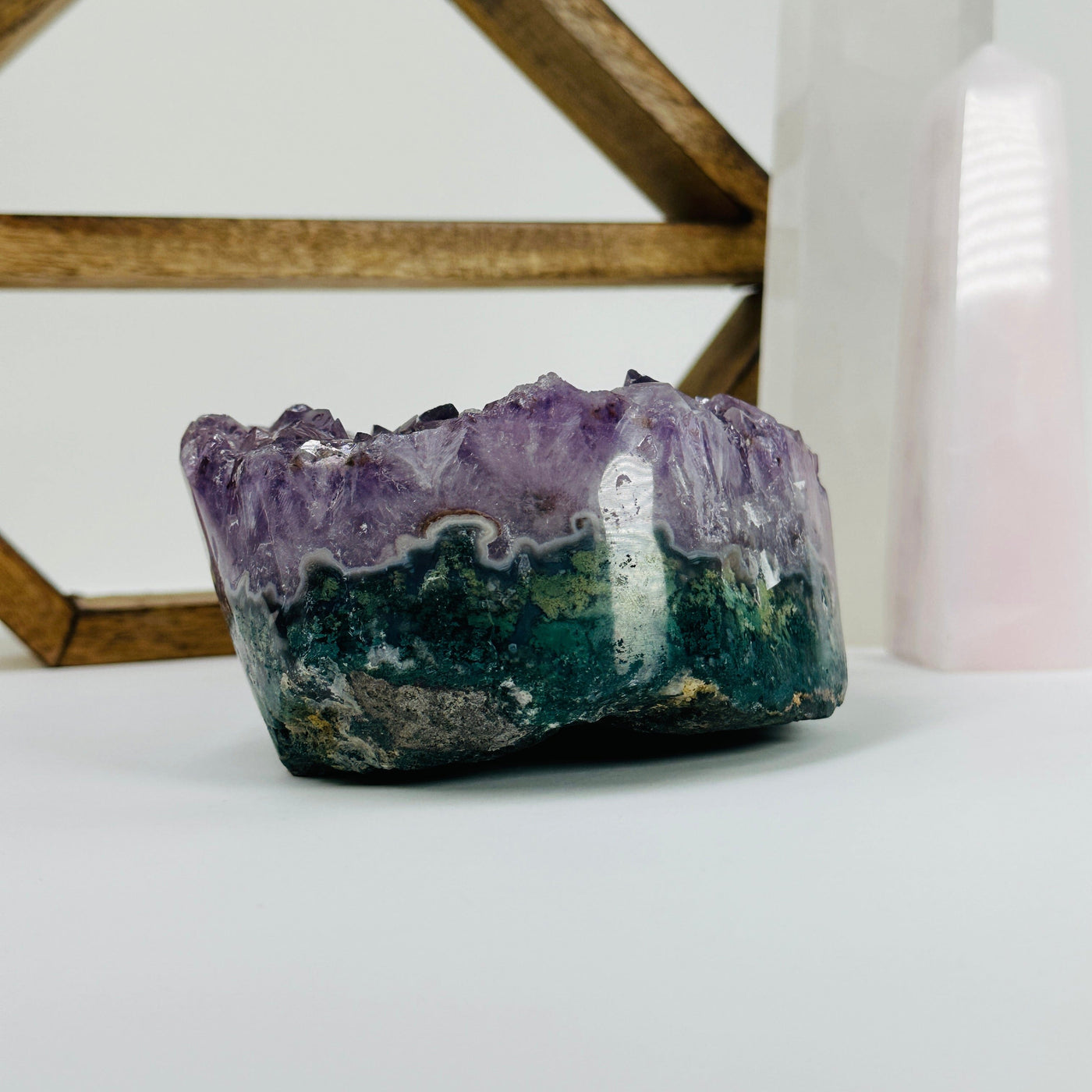 amethyst bowl with decorations in the background