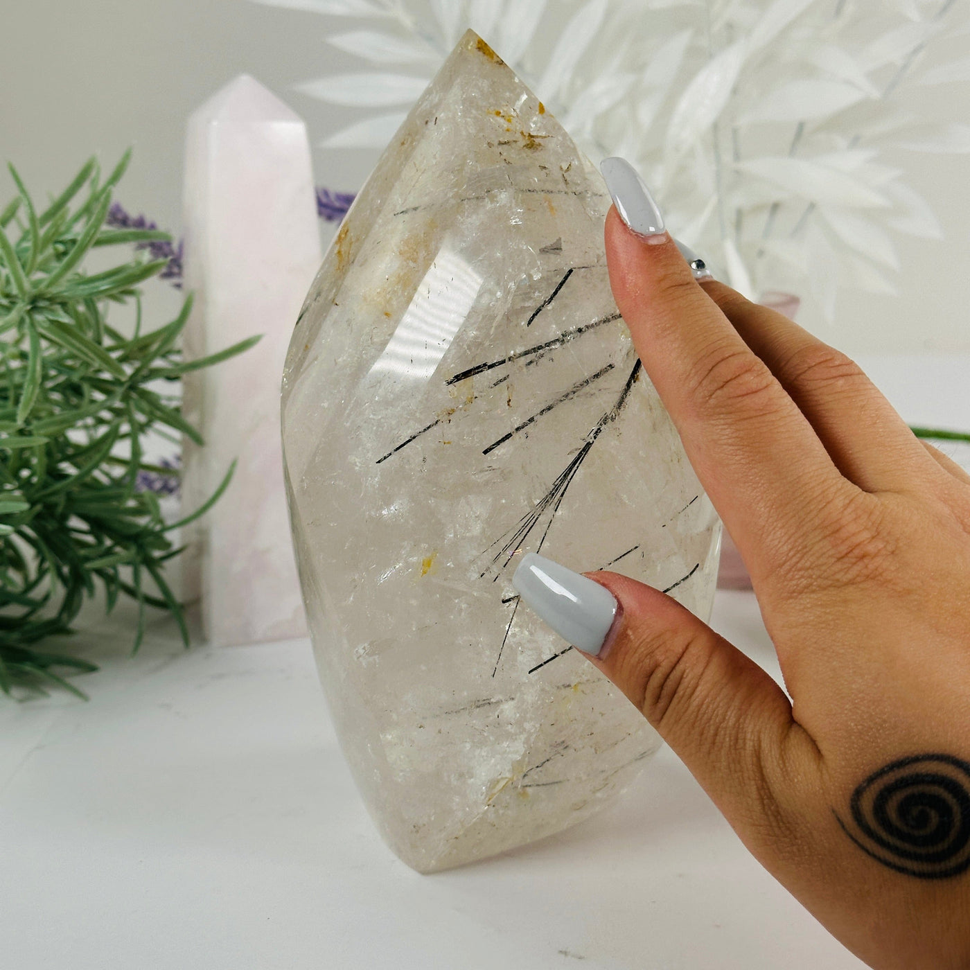 Golden Healer Quartz with Black Tourmaline - Crystal Flame Point Cut Base - One-of-a-Kind #3 with hand for size reference