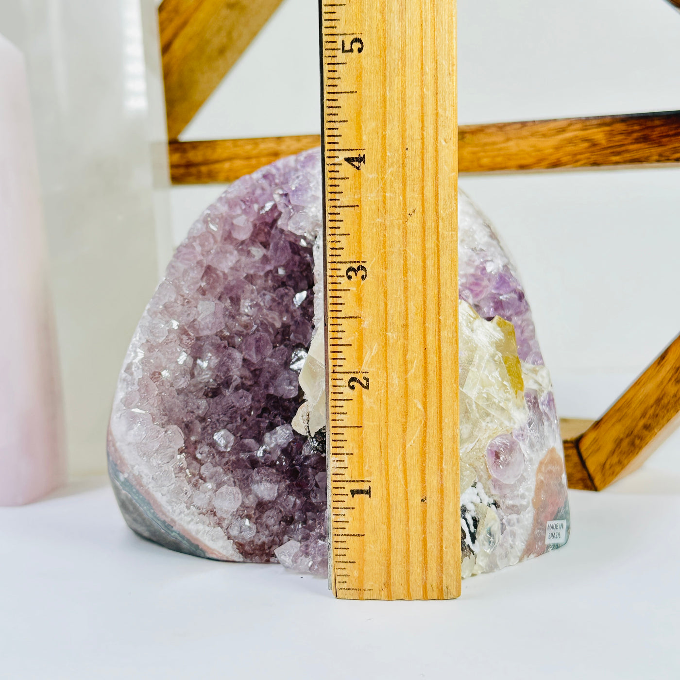 amethyst cut base next to a ruler for size reference