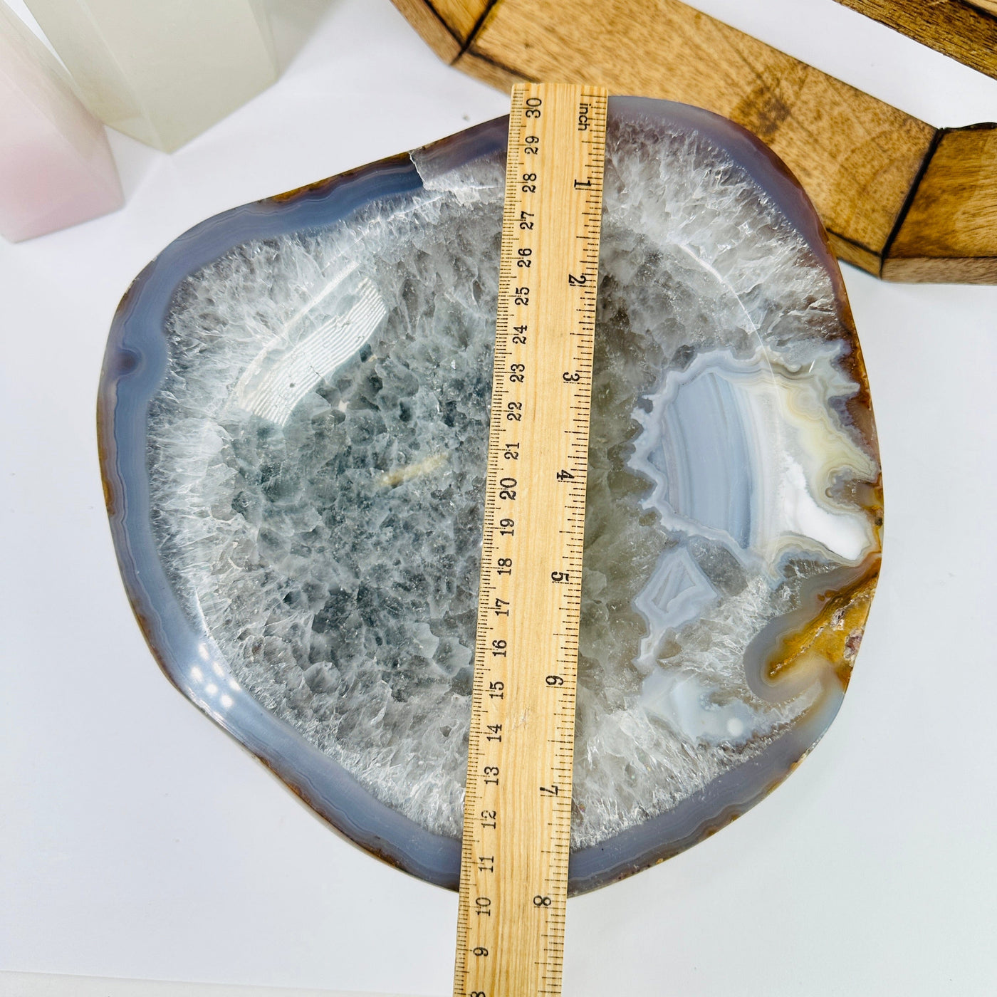 agate bowl next to a ruler for size reference