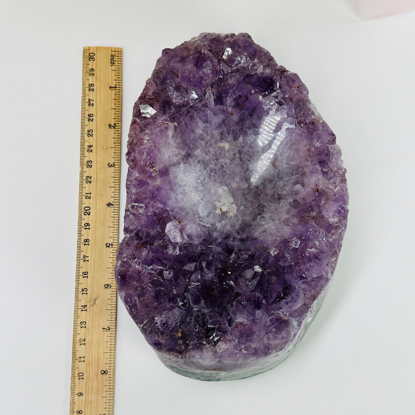 amethyst bowl next to a ruler for size reference
