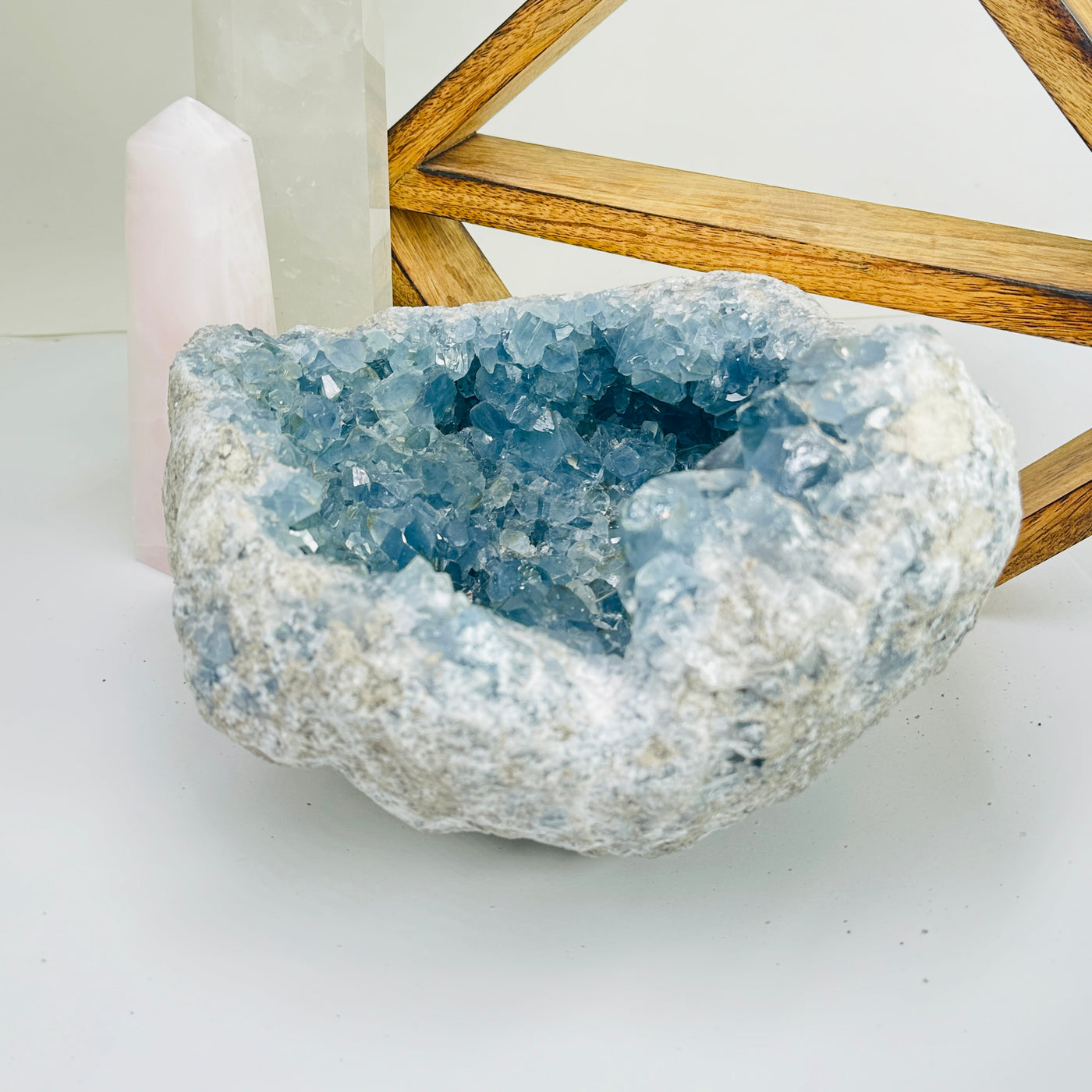 Celestite with decorations in the background