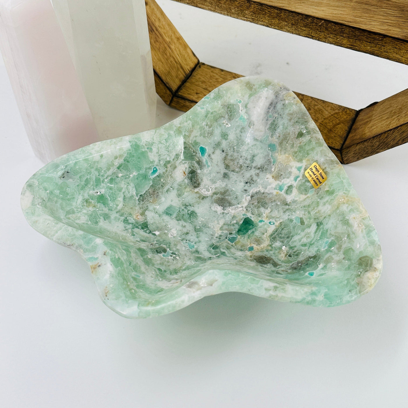 fluorite bowl with decorations in the background