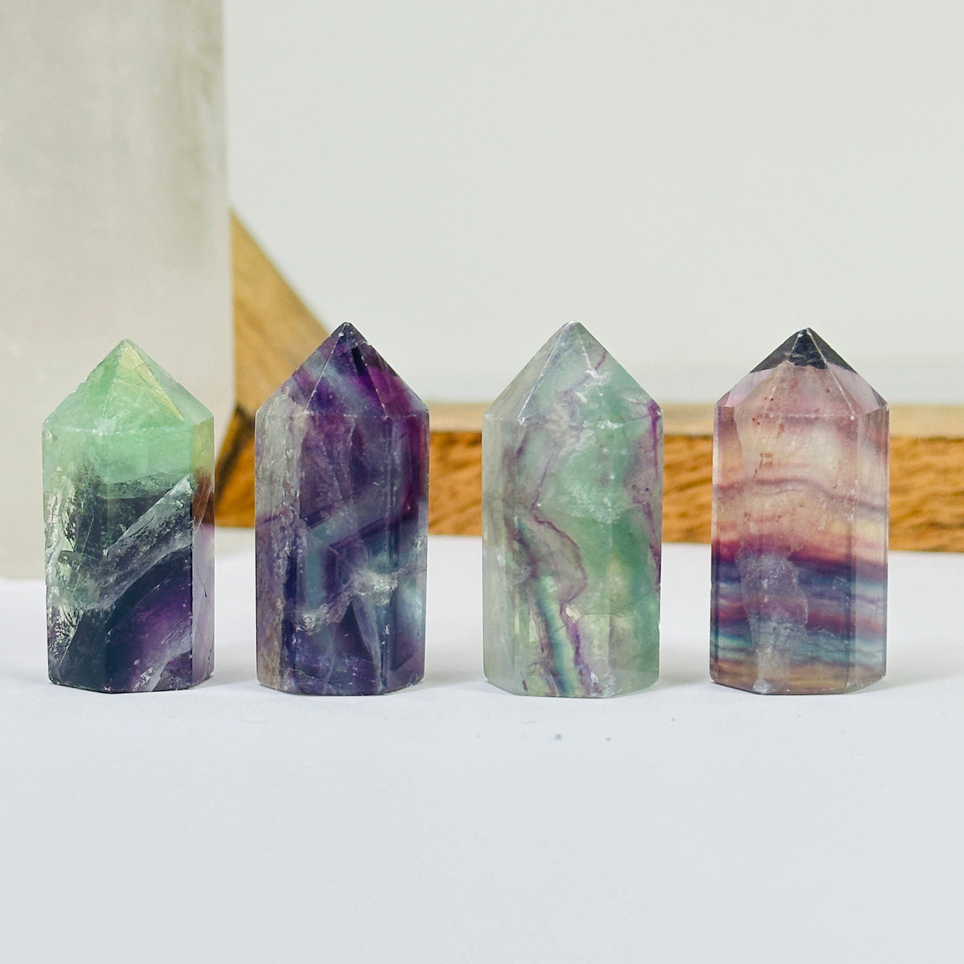 fluorite points with decorations in the background