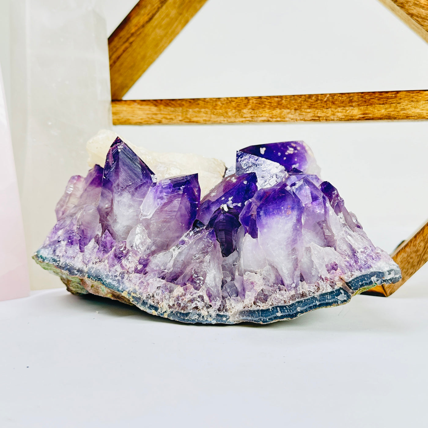 amethyst cut base with decorations in the background