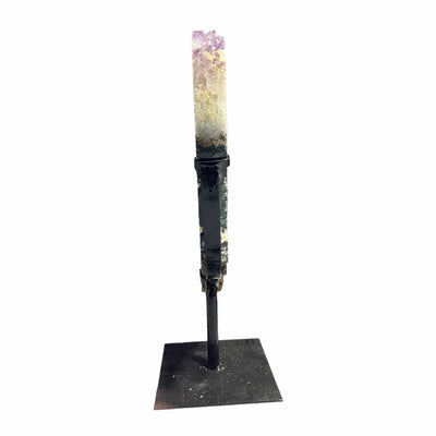 amethyst with jasper on metal stand on white background