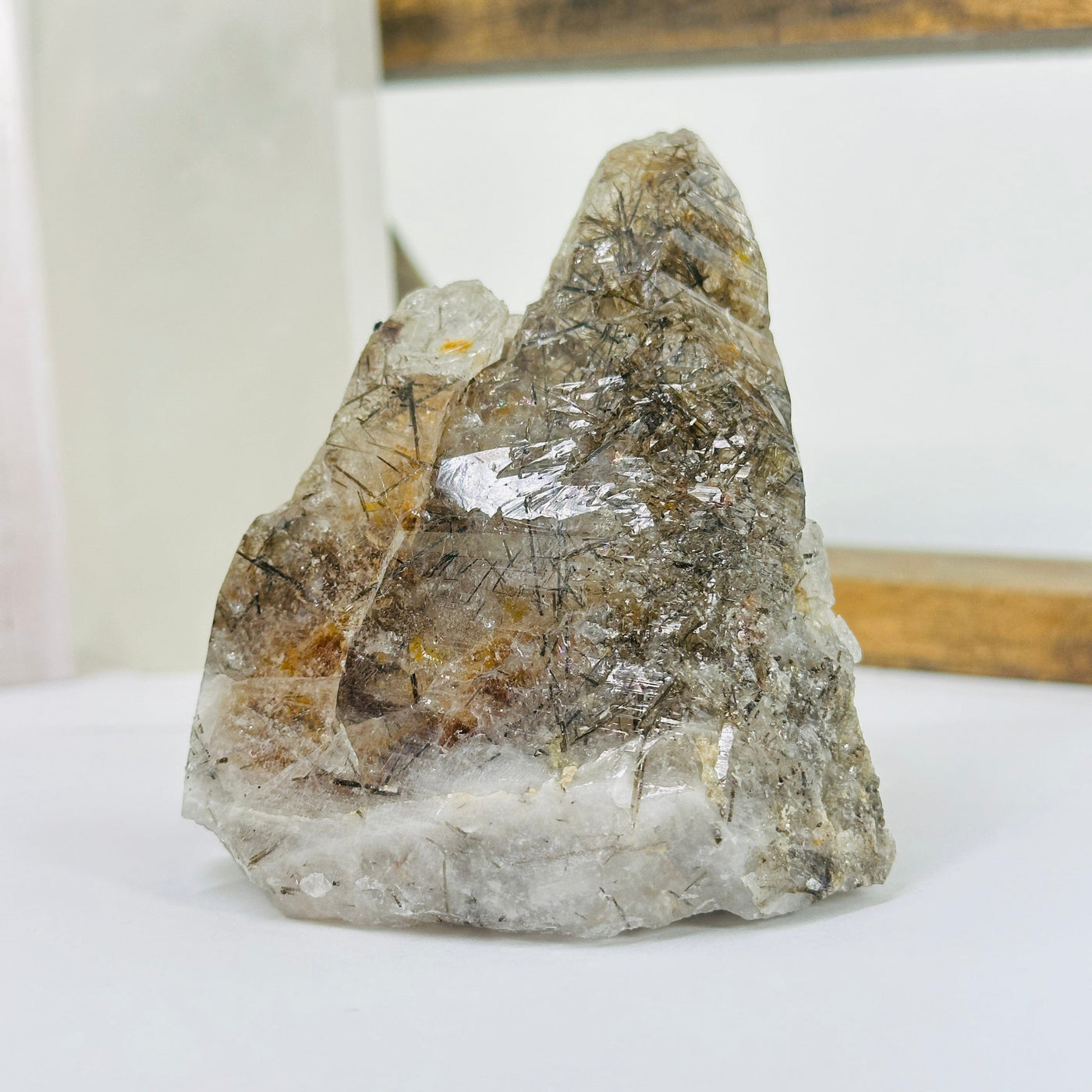 smokey quartz with decorations in the background