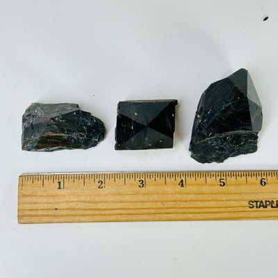 tourmaline points with decorations in the background