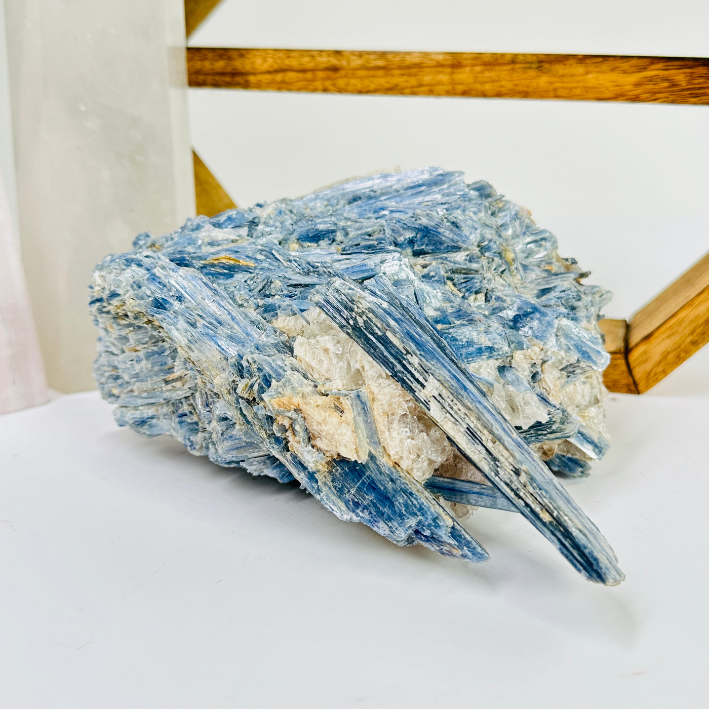 kyanite with decorations in the background