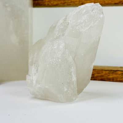 crystal quartz with decorations in the background