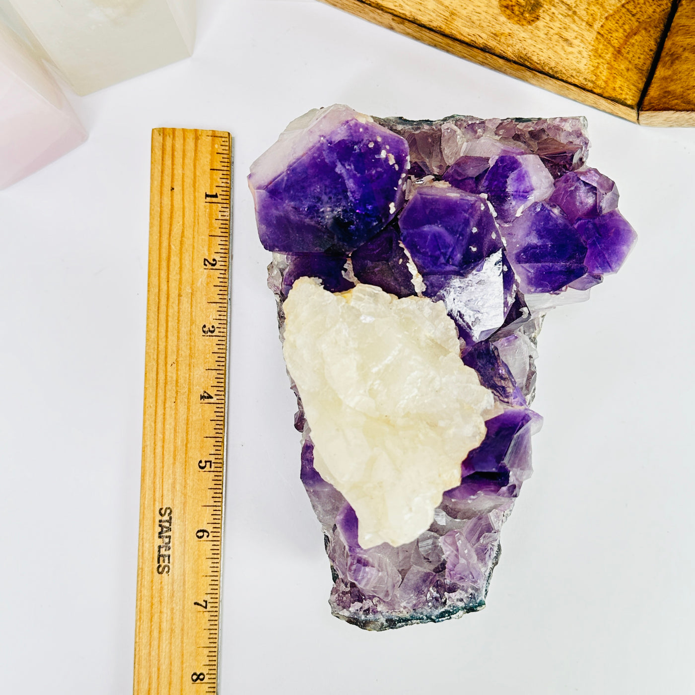 amethyst cut base next to a ruler for size reference