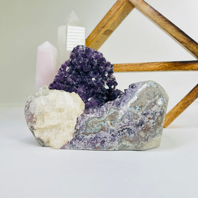 amethyst cut base with decorations in the background