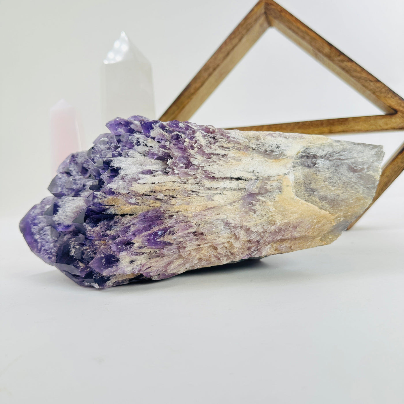 elestial amethyst with decorations in the background