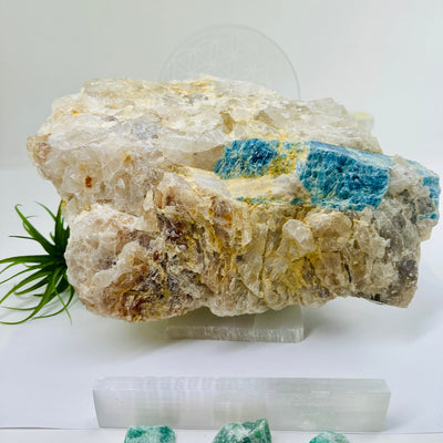 Aquamarine in matrix - giant aquamarine crystal embedded in large natural rough stone front view