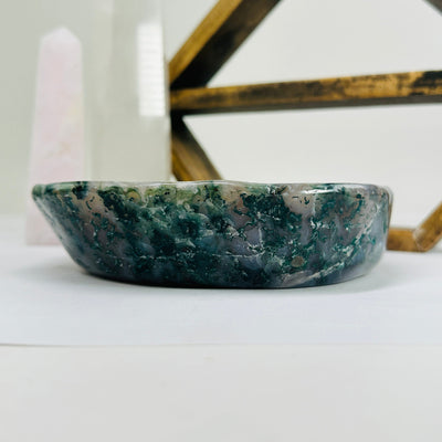 amethyst bowl with decorations in the background