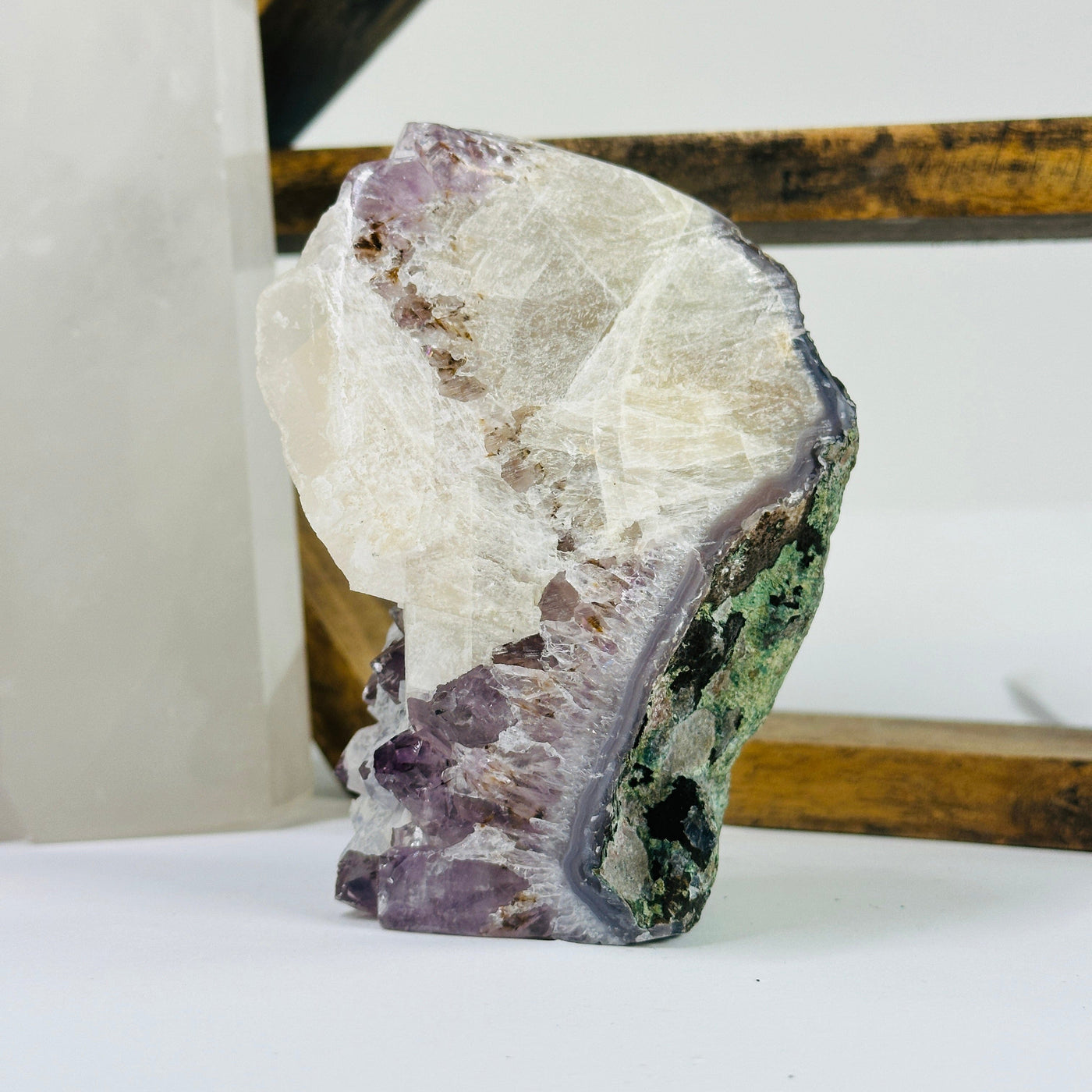 amethyst cut base with decorations in the background