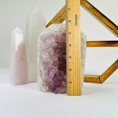 agate point next to a ruler for size reference