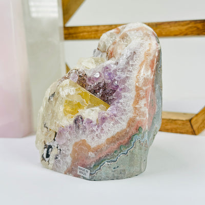 amethyst cut base with decorations in the background