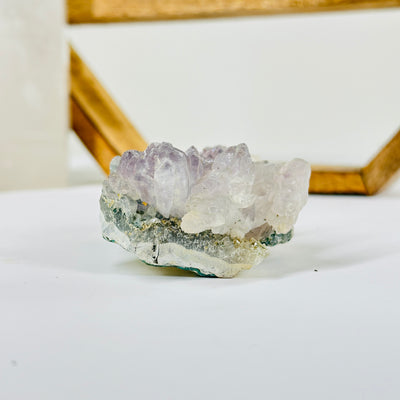 amethyst with decorations in the background