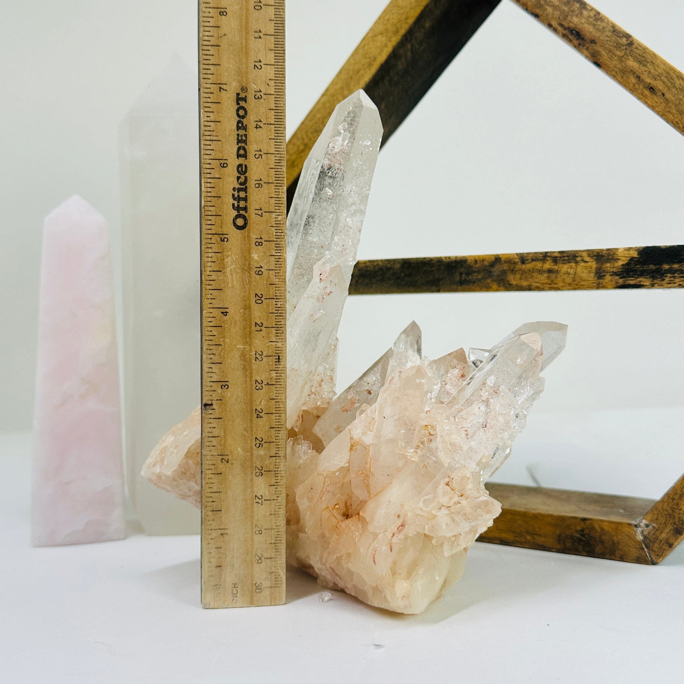 lemurian quartz next to a ruler for size reference