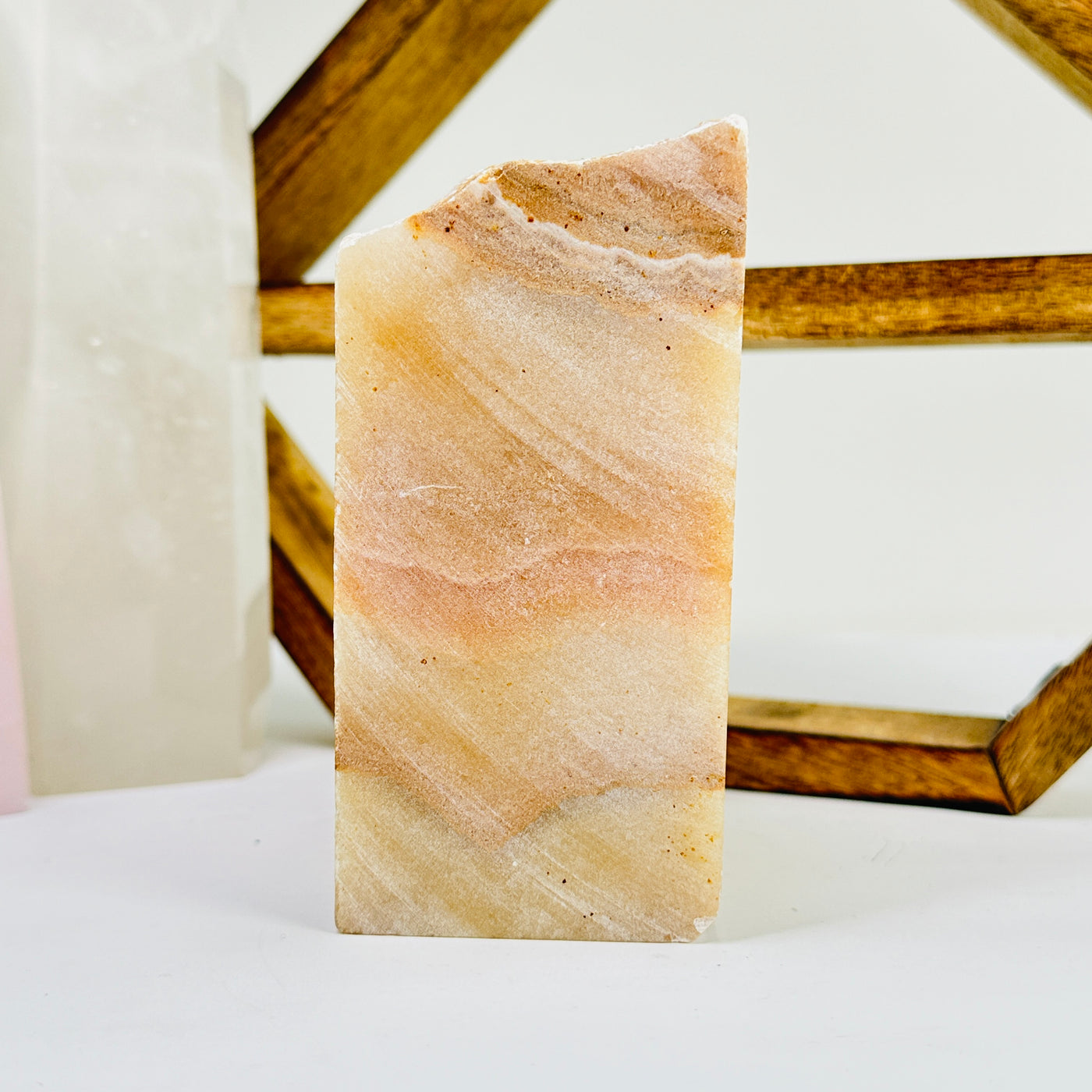 calcite cut base with decorations in the background