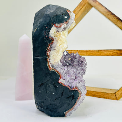 amethyst cut base with decorations in the background