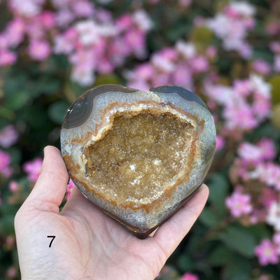 agate heart with decorations in the background