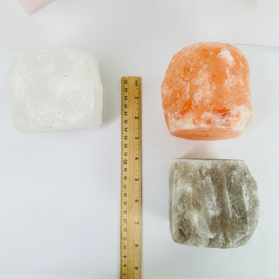 HIMALAYAN SALT CANDLE HOLDER next to a ruler for size reference