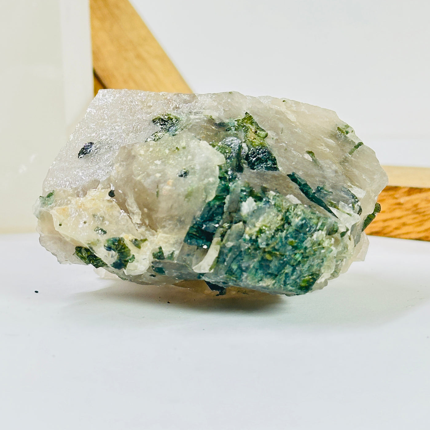 tourmaline with decorations in the background