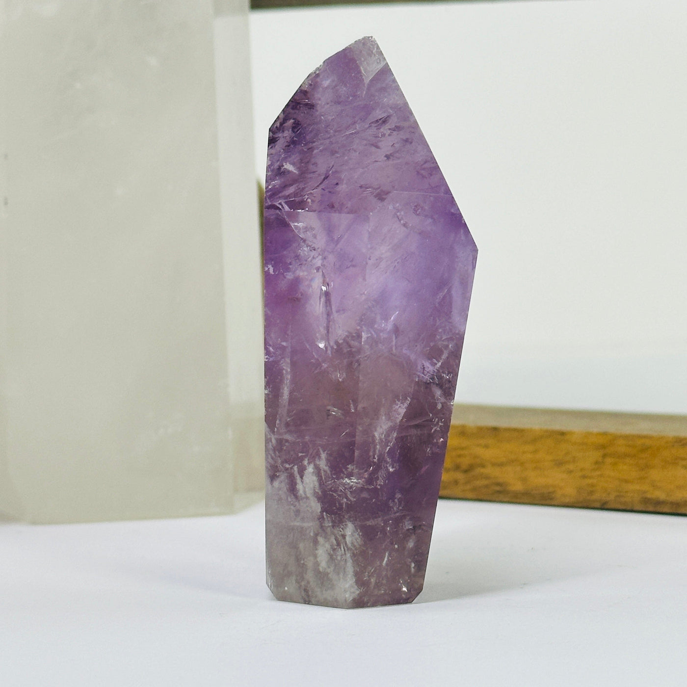 amethyst points with decorations in the background