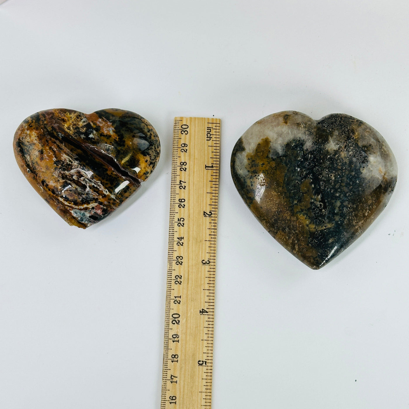 jasper heart next to a ruler for size reference