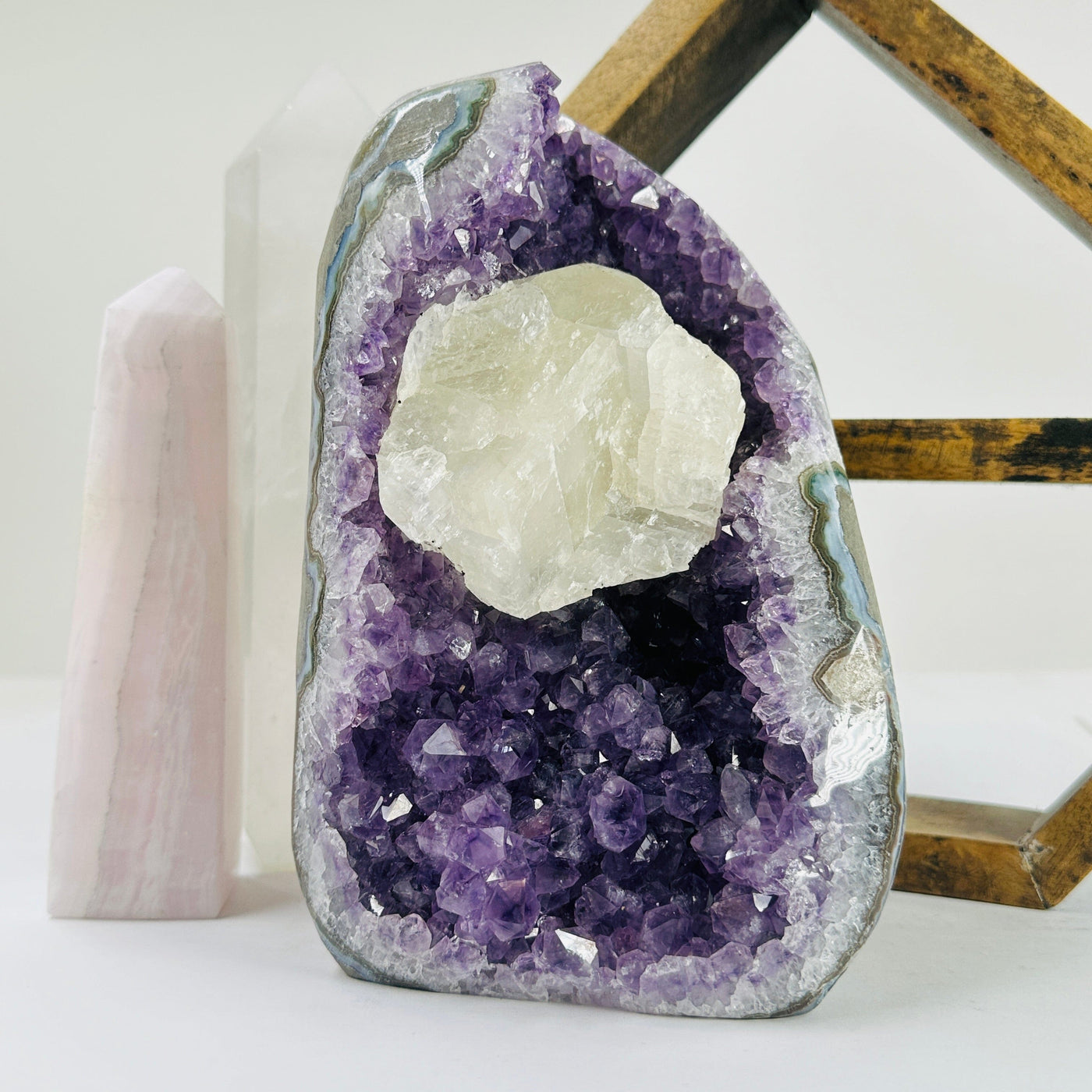 amethyst cut base with decorations in the background