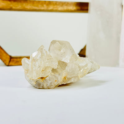 crystal quartz with decorations in the background