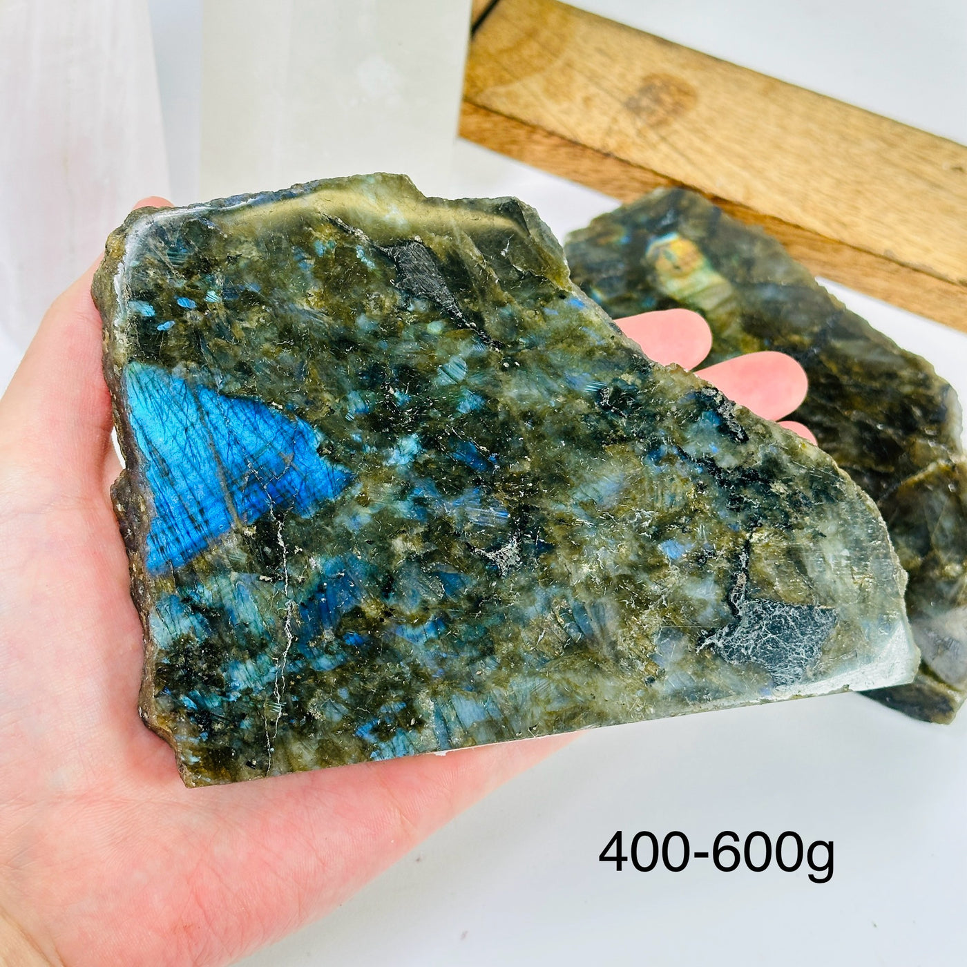 labradorite slab with decorations in the background