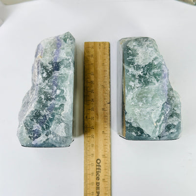 fluorite bookends next to a ruler for size reference
