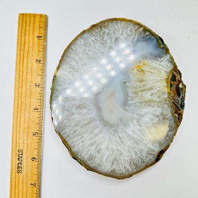 agate platter with decorations in the background