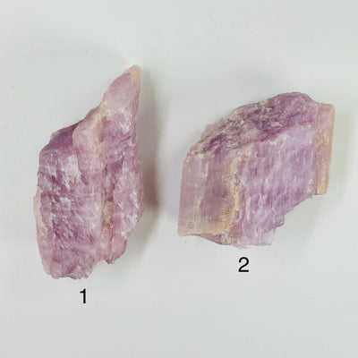 kunzite with decorations in the background