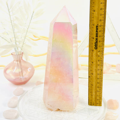 Angel Aura Rose Quartz Generator with Natural Inclusions next to ruler for size reference