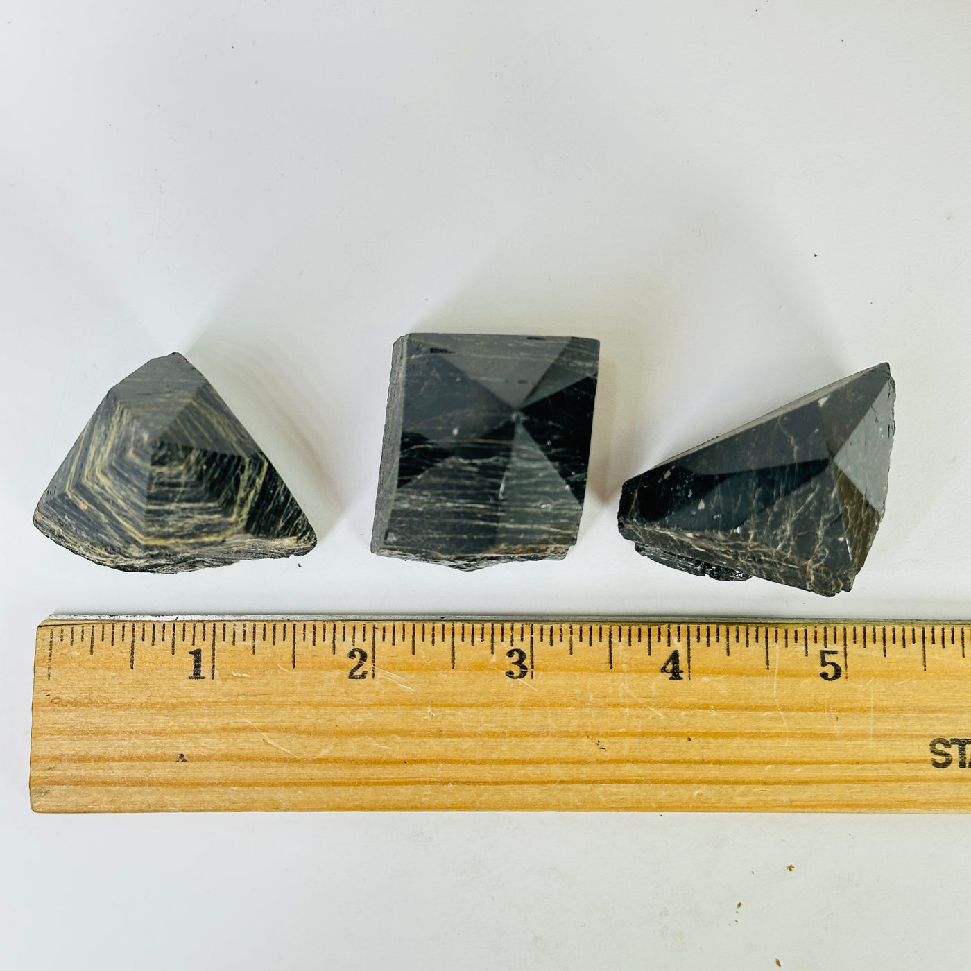 tourmaline points with decorations in the background