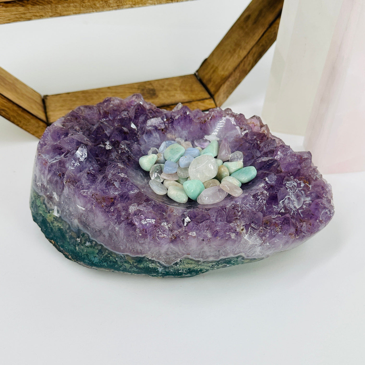 amethyst bowl with decorations in the background