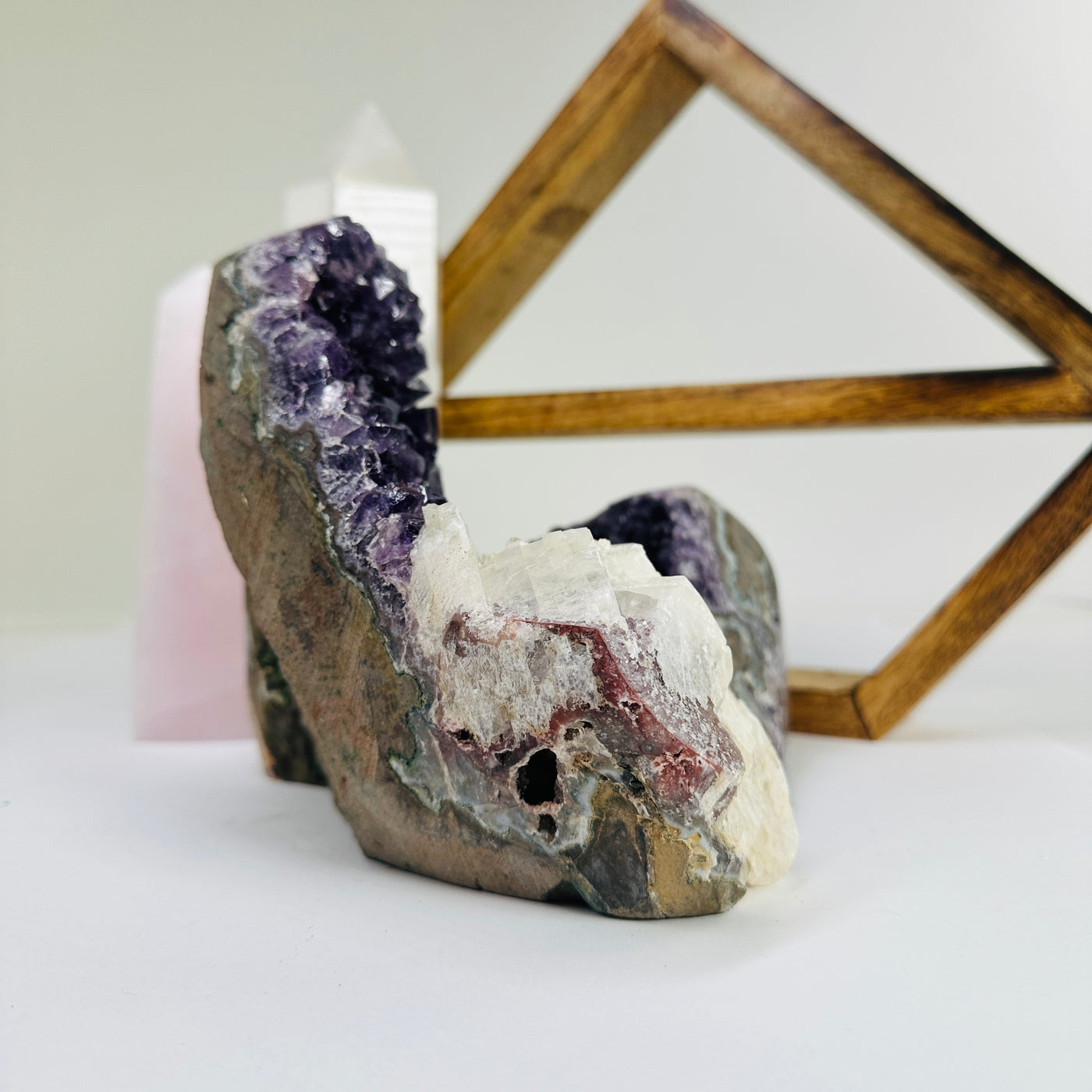 amethyst cut base with decorations in the background