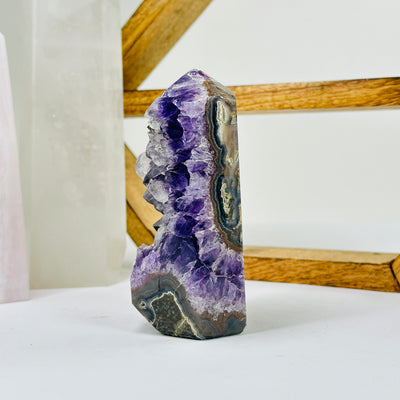 amethyst with decorations in the background