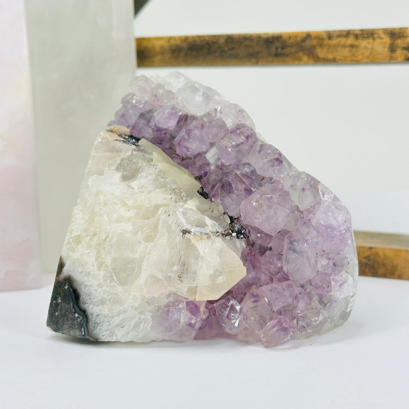 amethyst cut base with decorations in the background