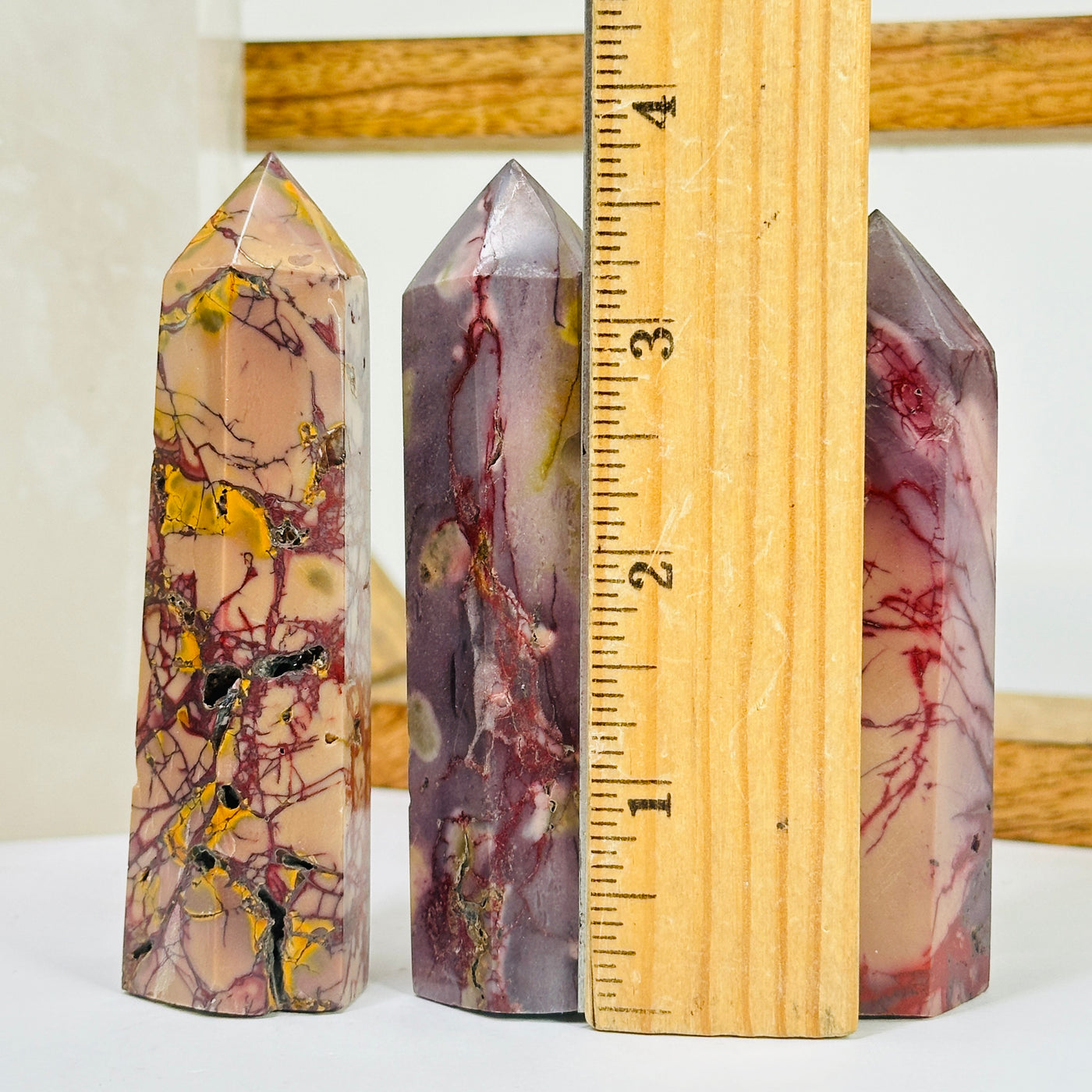 mookaite point next to a ruler for size reference