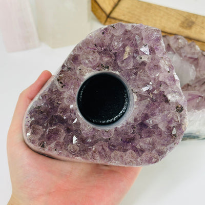 amethyst candle holder with decorations in the background